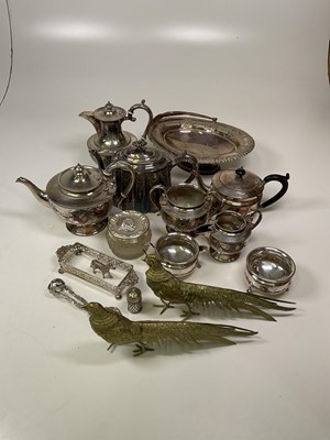 Lot 1005 - A quantity of silver plate including swing...