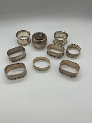 Lot 1036 - A group of nine variously hallmarked silver...