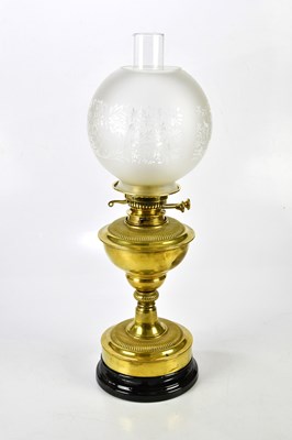 Lot 1603 - A Victorian brass oil lamp on an Art Nouveau...