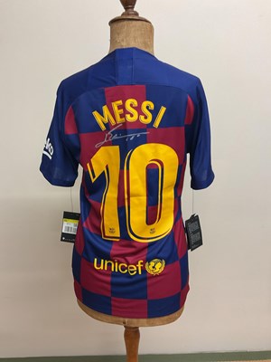 Lot 2339 - LIONEL MESSI; a Barcelona replica home shirt...