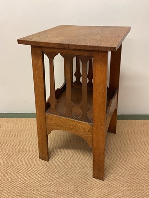 Lot 439 - IN THE LIBERTY STYLE; an oak Arts and Crafts...