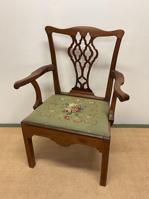 Lot 485 - A George III mahogany elbow chair with pierced...