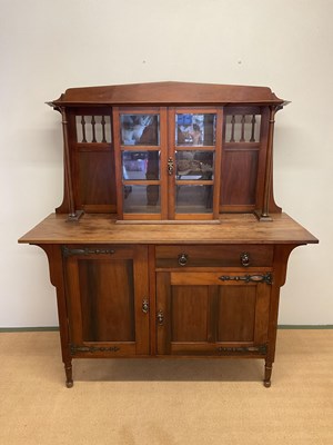 Lot 404 - An Arts and Crafts walnut sideboard with...