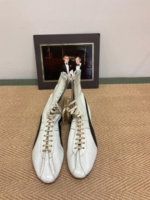 Lot 2322 - MUHAMMAD ALI; a pair of Puma Gong ankle boots...