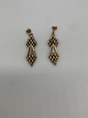Lot 1279 - A pair of 9ct yellow gold pierced drop...