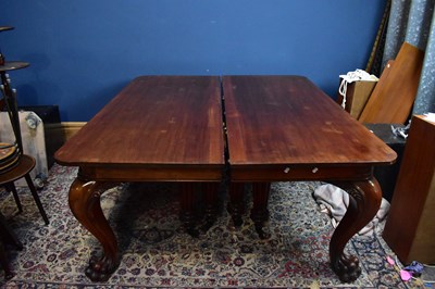 Lot 2432 - A large 19th century mahogany dining table...