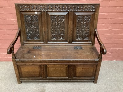 Lot 2367 - A late Victorian oak box seat settle with...