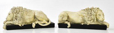 Lot 1443 - A pair of decorative plaster models of lions,...
