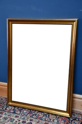 Lot 2591 - A modern gilt framed wall mirror, 86cm x 112cm.