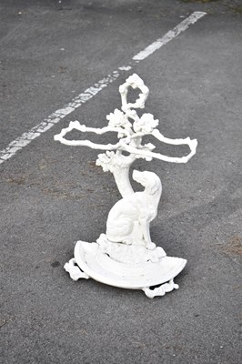 Lot 2268 - A white painted cast iron stick stand...