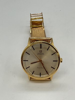 Lot 1302 - OMEGA; a gentleman's 1973 18ct yellow gold...
