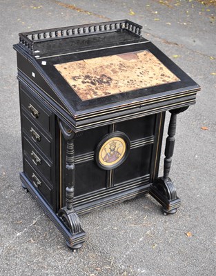 Lot 2459 - An Aesthetic Movement ebonised Davenport with...