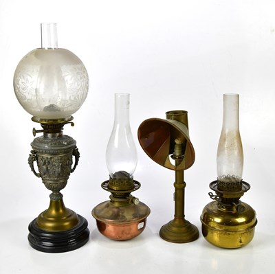 Lot 1614 - An early 20th century silvered metal oil lamp...