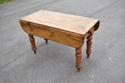 Lot 2392 - An old pine drop leaf Pembroke table, 73cm x...