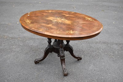 Lot 2461 - A Victorian inlaid walnut tilt-top loo table,...