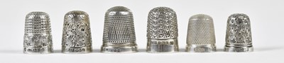 Lot 2370 - Six hallmarked silver thimbles including a...