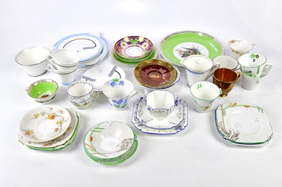 Lot 2061 - A collection of teacups, saucers, and trios,...