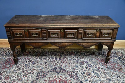 Lot 2360 - An 18th century oak dresser base with three...