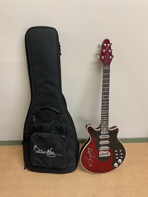 Lot 2001 - SIR BRIAN MAY; a 'Special Red' signed guitar.