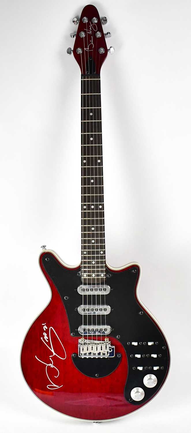 Lot 526 - SIR BRIAN MAY; a 'Special Red' signed guitar.