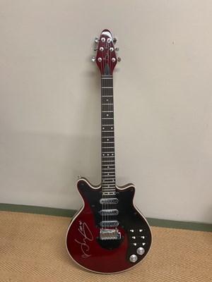 Lot 526 - SIR BRIAN MAY; a 'Special Red' signed guitar.