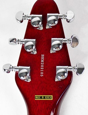 Lot 526 - SIR BRIAN MAY; a 'Special Red' signed guitar.