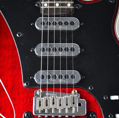 Lot 526 - SIR BRIAN MAY; a 'Special Red' signed guitar.