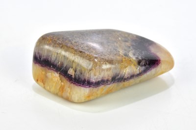 Lot 1400 - BLUE JOHN; a polished stone, length 10.5cm (1).