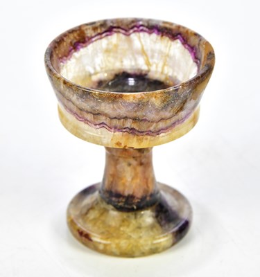 Lot 1397 - BLUE JOHN; a stem cup on circular plinth base,...