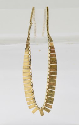 Lot 862 - A 9ct gold flat link graduated necklace,...