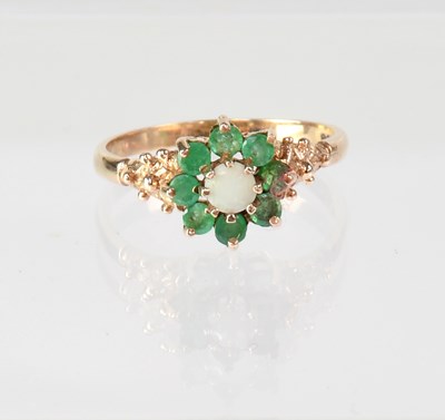 Lot 831 - A 9ct gold cluster ring set with opal and...