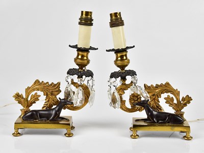 Lot 1589 - A pair of late 19th century gilt metal candle...
