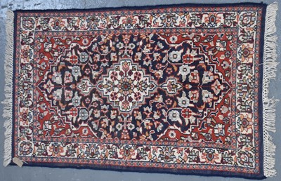 Lot 130 - A Persian hand knotted carpet, 150 x 90cm.