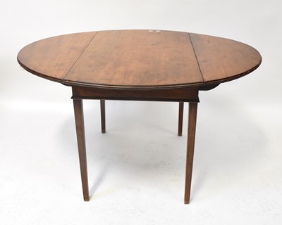 Lot 33 - A George III mahogany drop-leaf supper table...