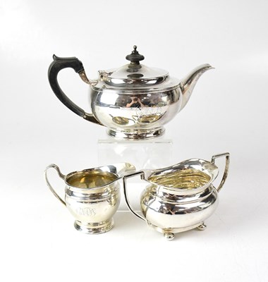 Lot 698 - A George V hallmarked silver teapot of squat...