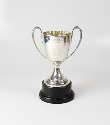 Lot 681 - A George V hallmarked silver twin-handled...