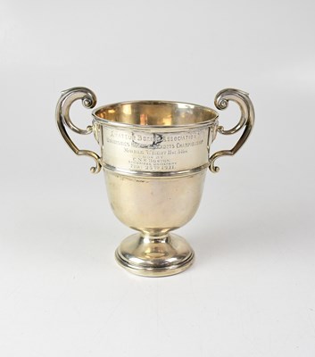 Lot 682 - A George V hallmarked silver twin-handled...