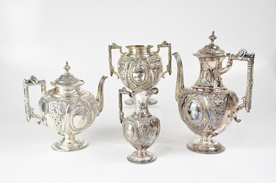 Lot 696 - A George V hallmarked silver four-piece tea...