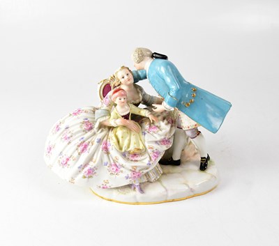 Lot 582 - MEISSEN; a porcelain figure group of a couple...