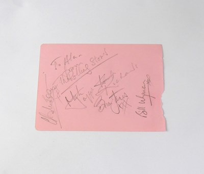 Lot 217 - THE ROLLING STONES; a torn page from an...