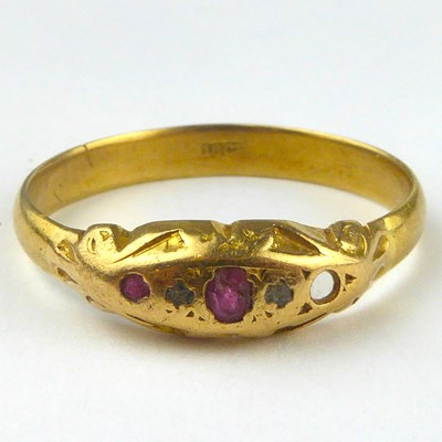 Lot 821 - An 18ct gold ring with ruby and diamond top,...