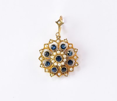 Lot 955 - A yellow metal pendant set with seed pearls...