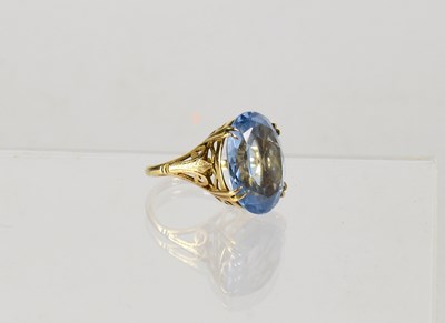 Lot 866 - A 9ct gold dress ring set with oval aquamarine...