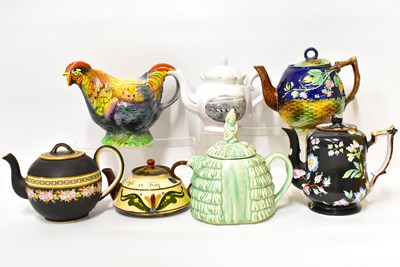 Lot 544 - Seven various decorative teapots to include...