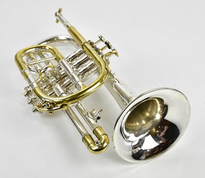 Lot 1290 - BOOSEY & HAWKES; a brass and silver plated...