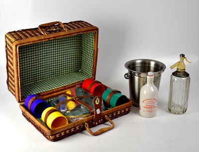 Lot 115 - A vintage wicker picnic basket