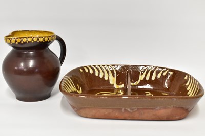 Lot 539 - A late 19th/early 20th century treacle glaze...
