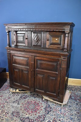 Lot 2366 - An 18th century oak court cupboard, the upper...