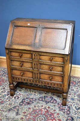 Lot 2394 - A reproduction oak bureau with fall front...