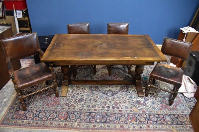 Lot 2365 - A reproduction oak draw-leaf refectory type...